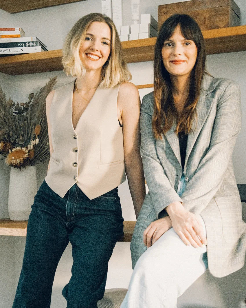 Portrait of Striā Lab co-founders Meg Gordon and Madeline Rush in warm natural light.